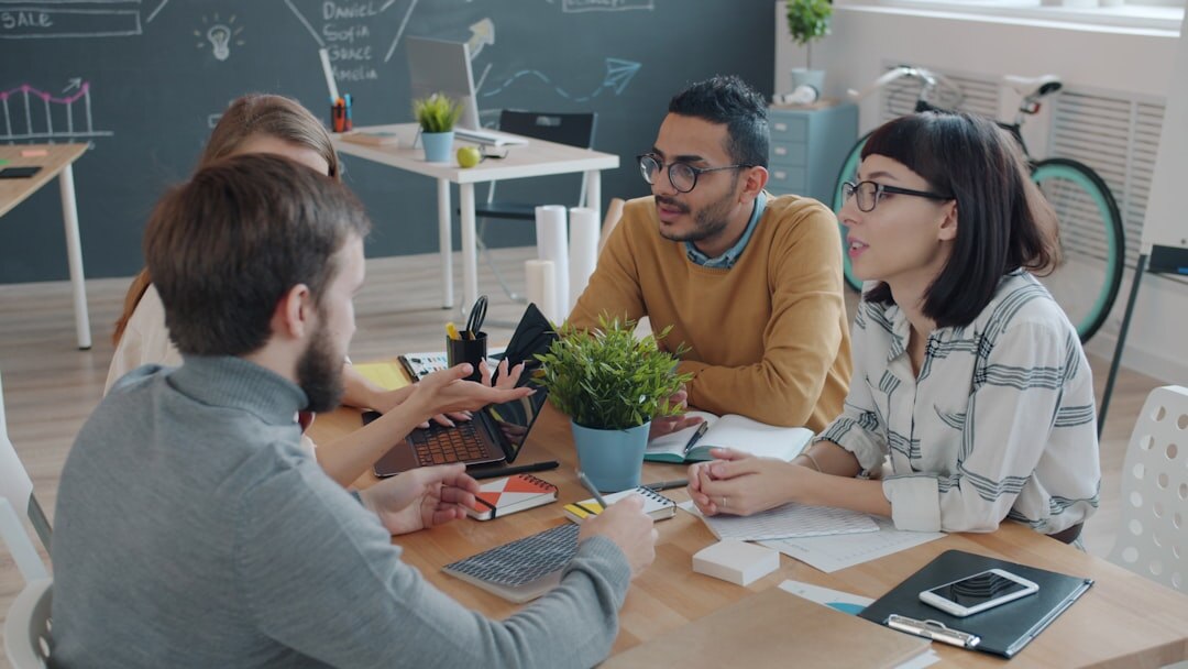 Startup team brainstorming in modern office
